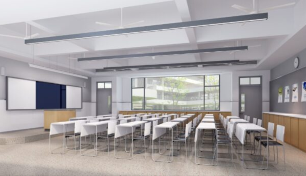 Classroom with with whiteboard and benches